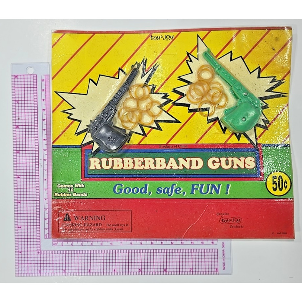 Vintage Vending Display Board Rubberband Guns 0529
